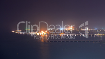 view on palm jumeirah man-made island in night illumination, dub