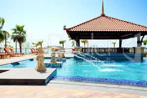 the swimming pool near beach in thai style hotel on palm jumeira