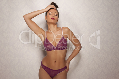 seductive sexy woman in trendy purple lingerie