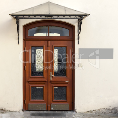 wooden doors with signage
