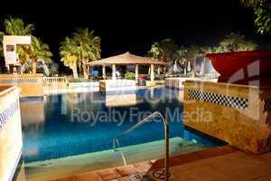 swimming pool in night illumination at the luxury hotel, sharm e