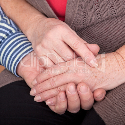 mature couple holding their hands