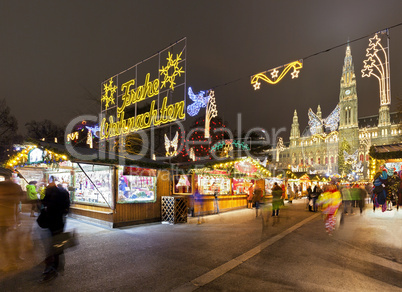 Vienna Town Hall and the traditional Christmas  Market at night