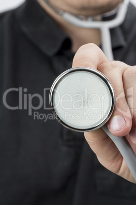 hand holding stethoscope