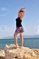 dancing girl on the rocks