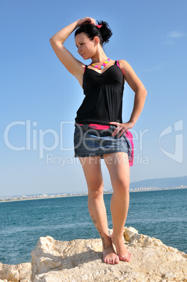 dancing girl on the rocks