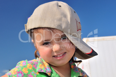 portrait of a girl in a baseball cap