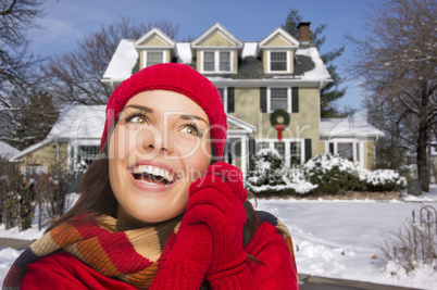 Smiling Mixed Race Woman in Winter Clothing Outside in Snow