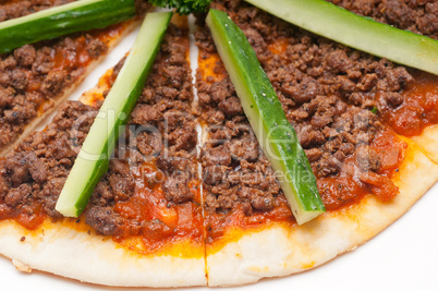 turkish beef pizza with cucumber on top