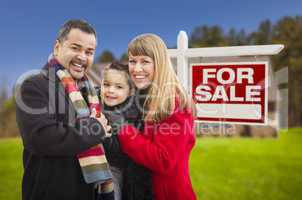 mixed race family, home and for sale real estate sign