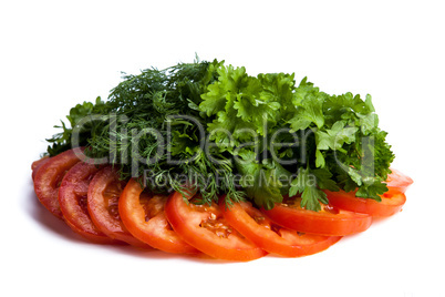 cut pieces of tomatoes and dill and parsley