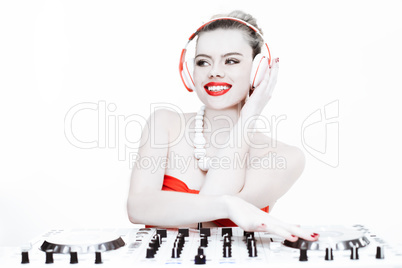 sexy female dj mixing music using the turntable