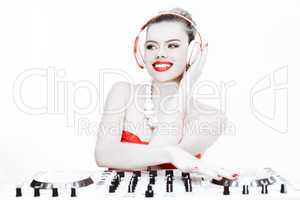 sexy female dj mixing music using the turntable