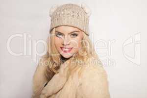 beautiful blond girl in winter fashion