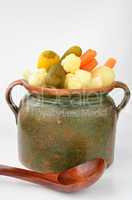 pickled vegetables in a clay pot