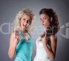 Image of funny bride and her friend posing faces