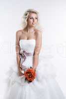 Charming young bride in elegant dress, close-up