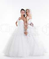 Image of beautiful shapely brides holding hands