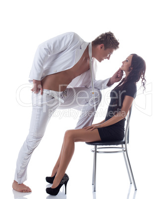 Image of young playful couple posing in studio