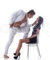 Image of young playful couple posing in studio