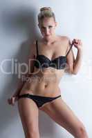 Fascinating young woman posing in erotic lingerie