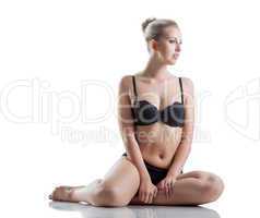 Sensual model posing in lingerie isolated on white