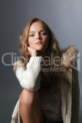 Image of attractive young model posing in sweater