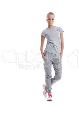 Athletic young woman posing in sportswear
