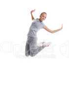 Image of smiling sporty girl jumping in studio