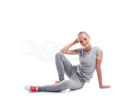 Smiling young athlete isolated on white background