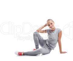 Smiling young athlete isolated on white background