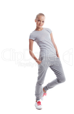 Slender young athlete isolated on white background