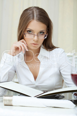 Portrait of pensive business woman in glasses