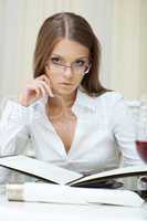 Portrait of pensive business woman in glasses