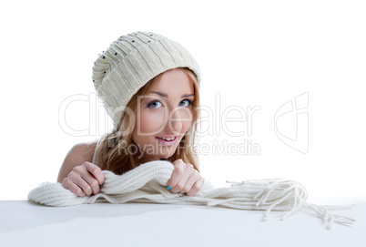 Portrait of beautiful model shows knitted garment