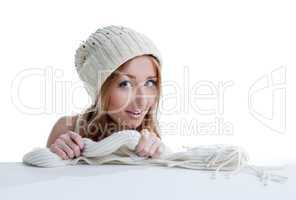 Portrait of beautiful model shows knitted garment