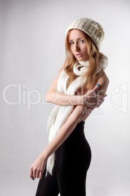 Portrait of slim girl posing in winter clothes