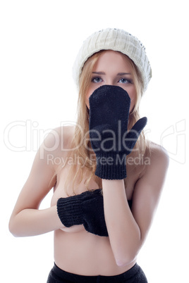 Portrait of young girl covering her face mitten