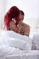 Image of passionate young lovers in bed