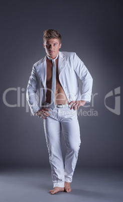 Image of sexy muscular dancer posing in studio