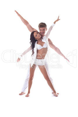 Image of young attractive dancers posing in studio