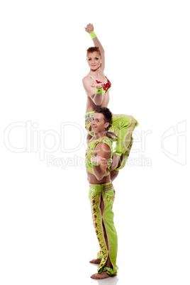 Smiling young artists posing in colorful costumes