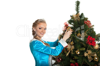 Beautiful Snow Maiden decorating Christmas tree