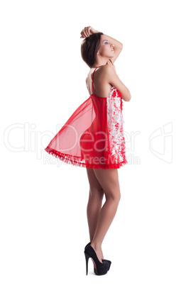Sensual slim mosel posing in red negligee