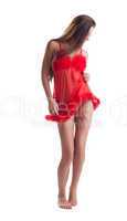 Image of slim young brunette in red negligee