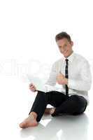 Image of happy young businessman showing thumbs up