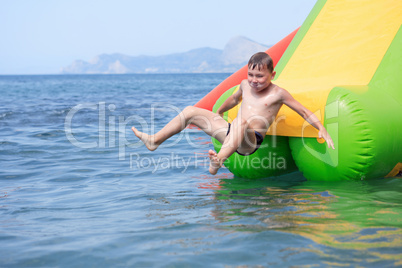 boy on water slide