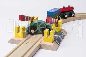 toy car on railroad crossing