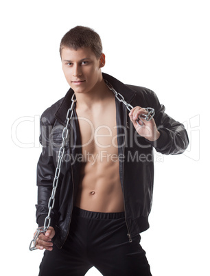 Confident sexy man posing in leather jacket