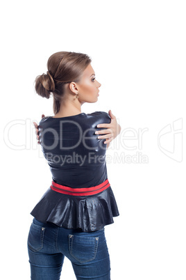 Image of stylish brunette posing back to camera